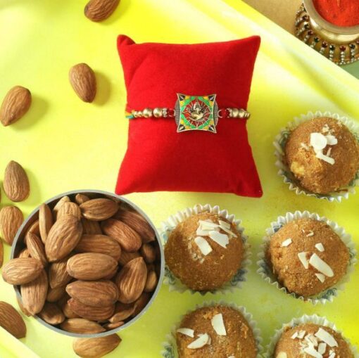 Rakhi with Besan Ladoo & Almonds — Online Delivery in Guwahati | Petalscart