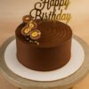 Round Premium Ferrero Rocher chocolate cake for birthday with Happy Birthday topper – available for delivery in Guwahati
