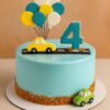 Custom car theme birthday cake for boys in Guwahati with yellow and green cars, blue glaze, balloons, and road design