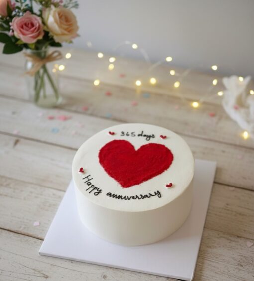 Beautiful 365 days love anniversary cake with red heart design, perfect romantic cake for couples, available at Petalscart Guwahati.