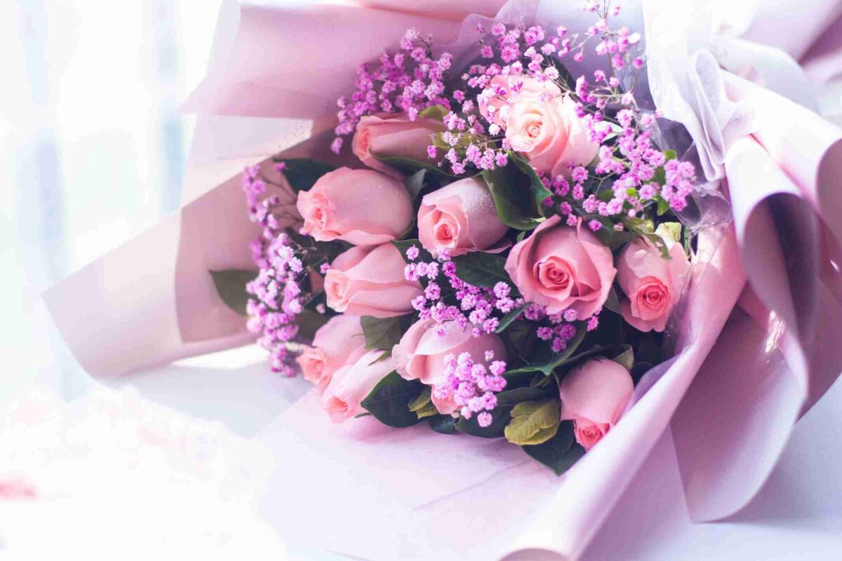 flower bouquet wrapped in tissue paper beautifully design for birthday, anniversary in Guwahati with same day delivery