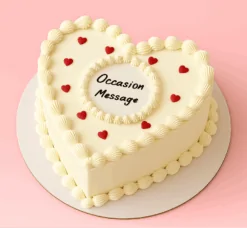 Custom heart shape message cake with cream and red hearts available for online order in Guwahati